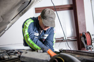 Amerit technician performing fleet maintenance service