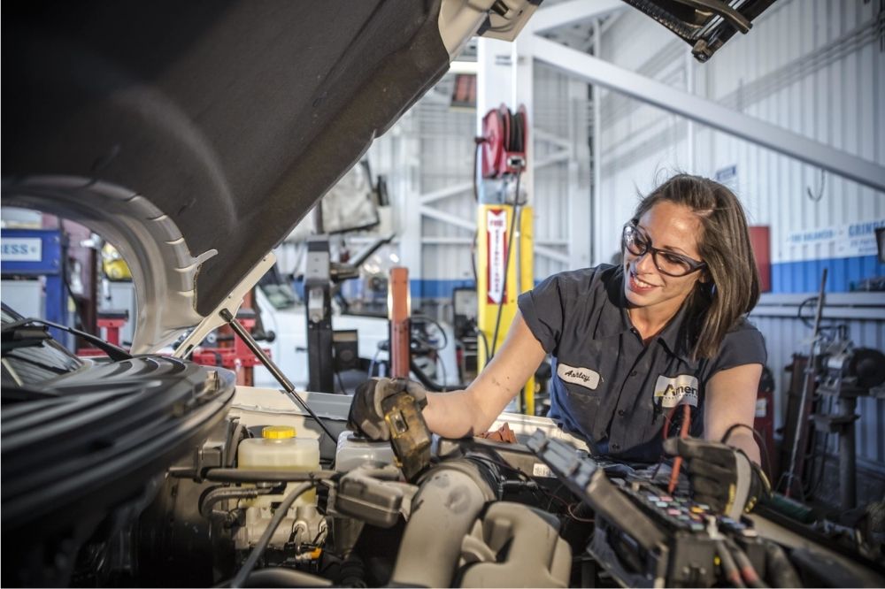 An Amerit technician performing maintenance in fleet service centers.