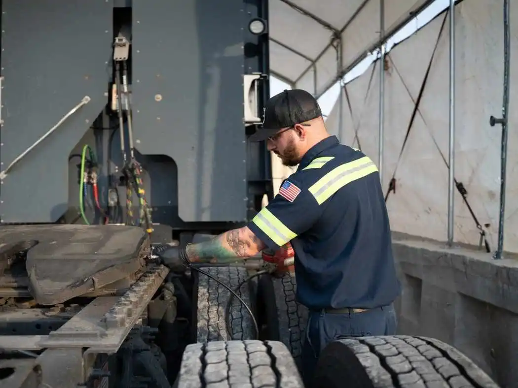 amerit technician performing a dot inspection on chassis