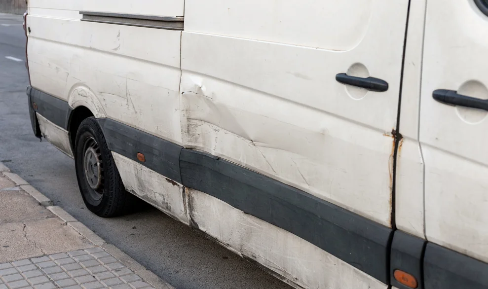 Van in minor accident with dents
